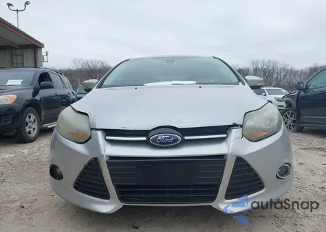 2012 Ford Focus Titanium z USA, uszkodzony, nr VIN 1FAHP3N25CL300457